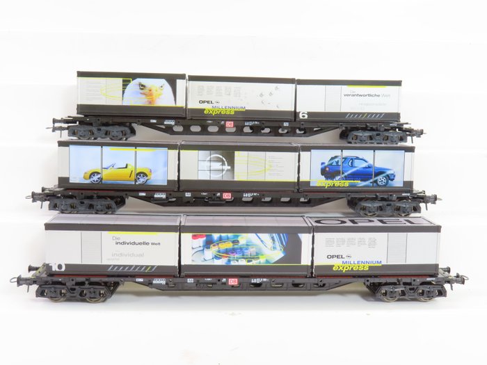 Roco H0 - 47975/47979 - Modellbahn-Güterwagen (3) - Drei 4-achsige Containertragwagen „Opel Millennium Express“ - DB