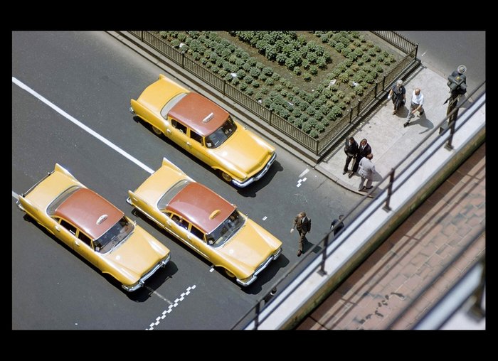 Ernst Haas - New York, 1957. Bird’s eye view of three taxicabs in the borough of Manhattan.