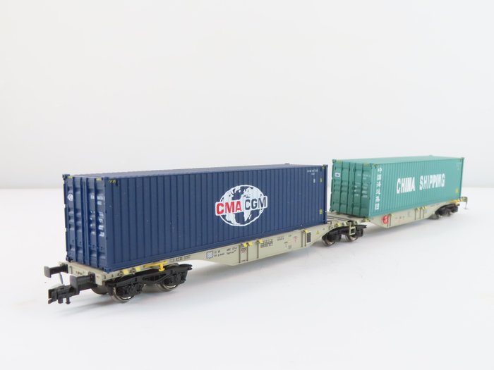 Mehano H0 - 58637 - Carrozza merci di modellini di treni (1) - Carro portacontainer a 6 assi con carico e scritta "CMA CGM" e "China Shipping" - AAE Cargo