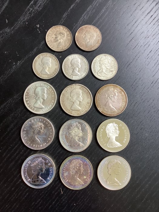 Canadá. A lot of Canadian Silver Dollars (x9) and Half Dollars (x5), includes Proof Commemoratives 1942-1989