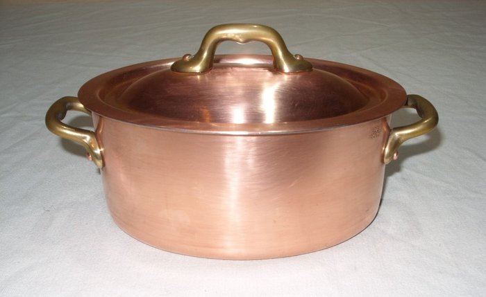 Een degelijke ovale pan met deksel Made in France - Cazo - Cobre, latón