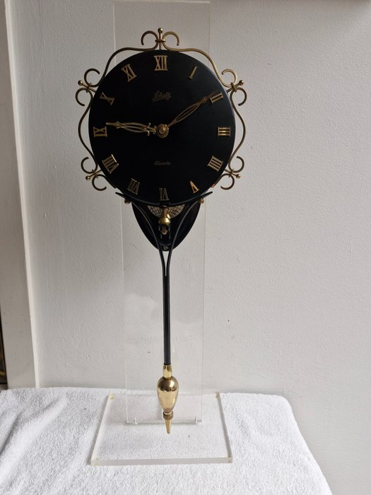 Zegar ścienny - Tajemniczy zegar wahadłowy - Schatz - metal, mosiądz - 1950-1960
