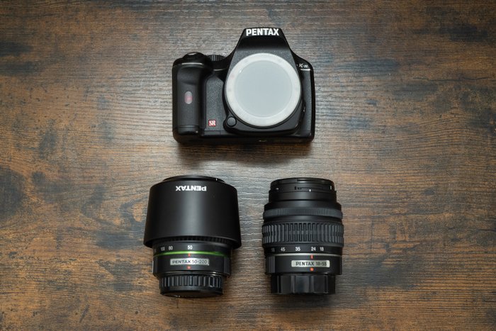 Pentax Als nieuw Pentax KM + 18-55mm en 50-200mm met tas Digitaalinen peiliheijastuskamera (DSLR)