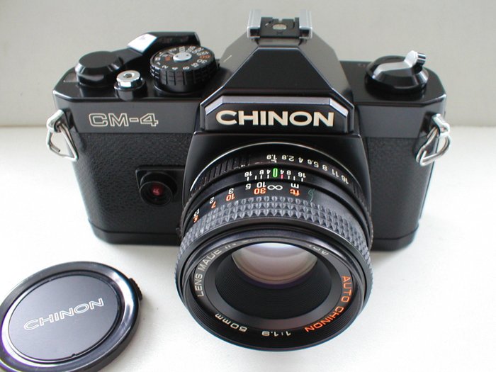 Chinon CM-4 reflexcamera met Chinon 50mm F/1.9 lens Et objektiv speilreflekskamera (SLR)