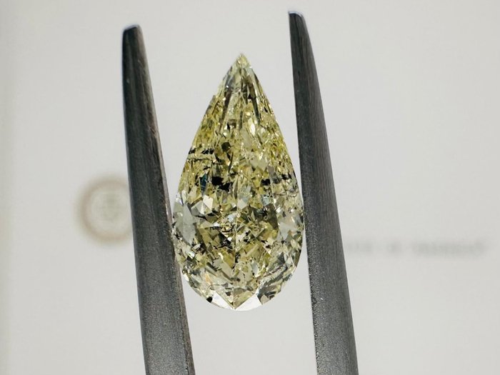 1 pcs Diamond - 1.37 ct - Brilliant, Pear - fancy light yellow - Not mentioned on certificate