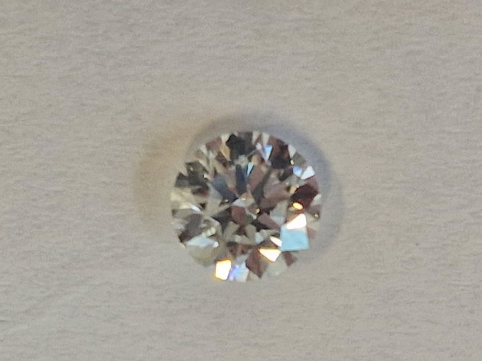 1 pcs Diamant - 0.71 ct - Brillant - E - VVS1