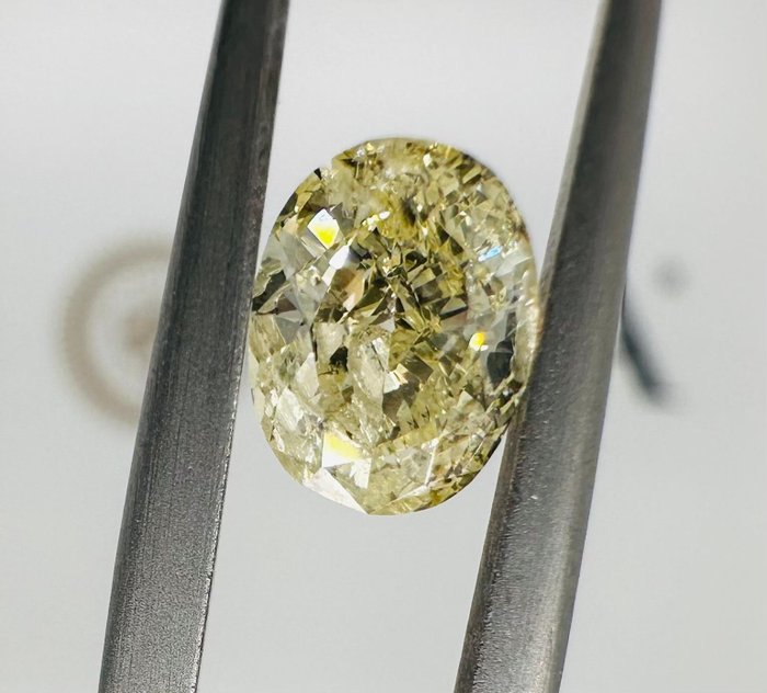 1 pcs Diamant - 1.01 ct - Brilliant, Oval - fancy yellow - Ikke nevnt på attesten