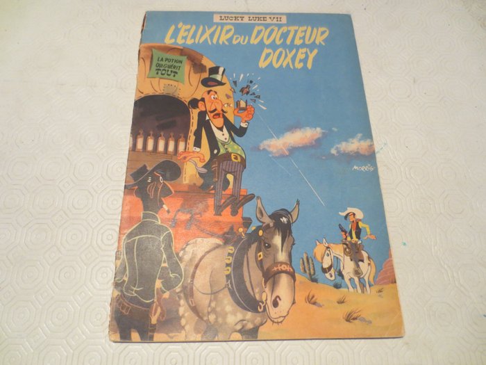 Lucky Luke T7 - L'Élixir du Docteur Doxey - B - 1 Album - Første belgiske udgave - 1955