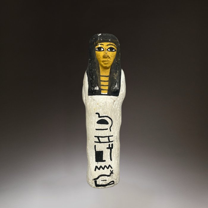 Réplica del antiguo egipcio. Estatua Ushabti de madera con jeroglíficos