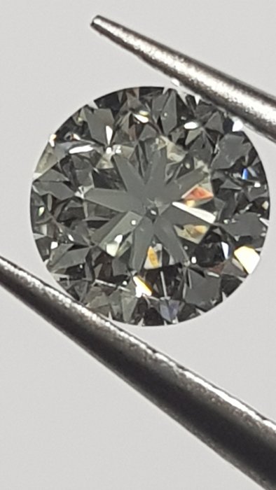 1 pcs 鑽石 - 0.90 ct - 明亮型 - I(極微黃、正面看為白色) - VS2