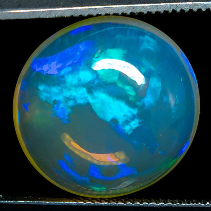 天然透明威洛蛋白石凸圆面 8.45 克拉- 1.69 g