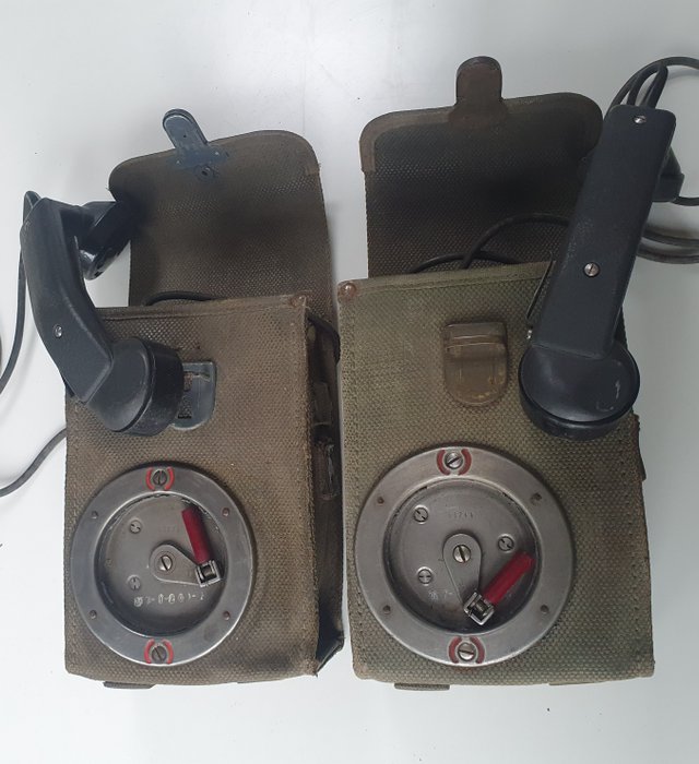 Switzerland - 2 Army field phones, made for the Dutch army. - 1950's./1960's - Field phone