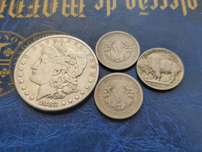USA. A lot of 4x USA coins, consisting of an 1882 Morgan Dollar, and three nickels 1891, 1904, 1917  (Ohne Mindestpreis)