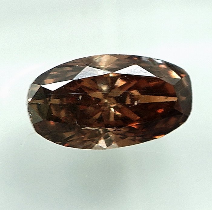 Gyémánt - 0.78 ct - Ovális - Natural Fancy Deep Orangy Brown - SI2