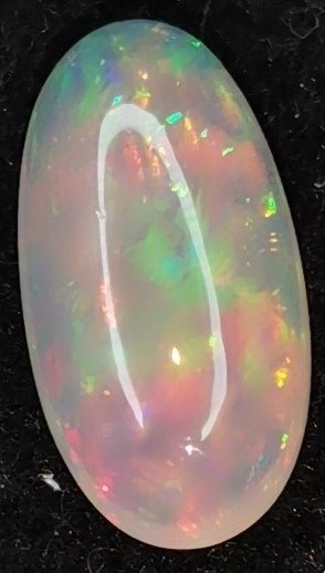 Lichtoranje + kleurenspel (intens) Kristal opaal, ovaal, cabochon, 21,38 x 11,02 x 7,02 mm - 8.93 ct
