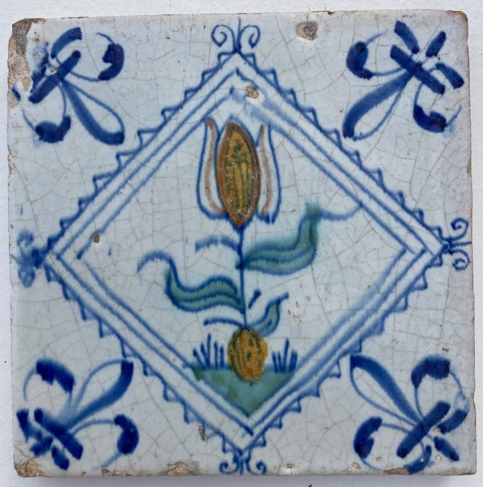 Tile - Delft blue tile with a large tulip in a stamp square - 1600-1650 