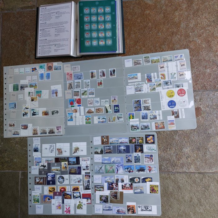 Uma terra 1984/2017 - coleção de selos e folhas de Natal em álbum e em folhas