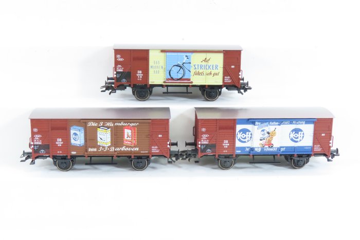 Märklin H0 - 48783 - Conjunto de vagones de tren de mercancías a escala (1) - Set de vagón de mercancías de 3 piezas "Wirtschaftswunder" con vagón cerrado de 2 ejes con impresión - DB