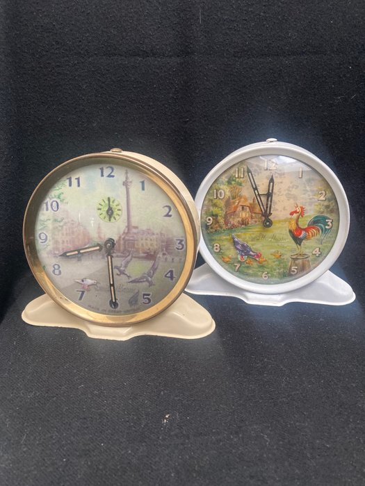 2x Ceas cu alarmă cu animație  (2) - Smith alarm - Alamă, Oțel, Sticlă - 1940-1950