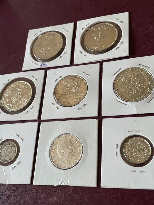 Maailma. Collection of 8 International Slver Coins 1915/1975  (Ei pohjahintaa)