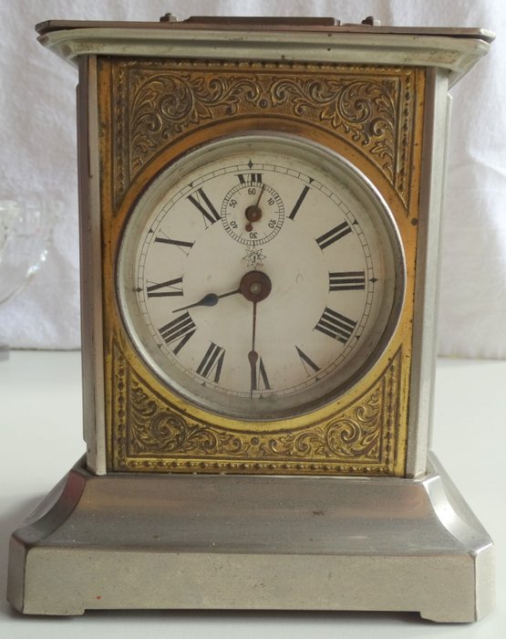 Junghans väckarklocka med speldosa - Mässingshus - glas - förkromad metall - 1910-1920