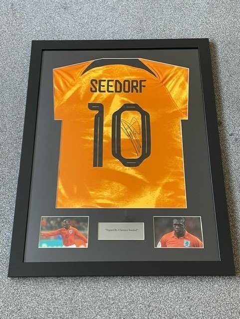 Netherlands - Campeonatos mundiais de futebol - Clarance Seedorf - Camisa de futebol com moldura assinada 