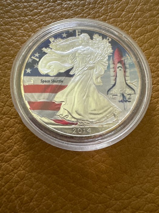 USA. 1 Dollar 2014 'American Eagle - Space Shuttle' in Farbe, 1 Oz (.999)  (Utan reservationspris)