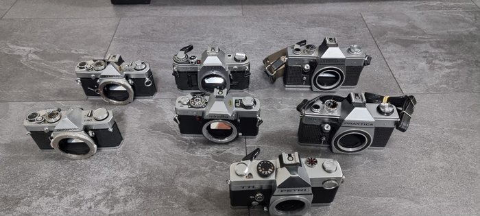 Canon, Minolta, Olympus, Petri, Praktica OM-1, TTL, MTL 3, XG9 en AE1 | Egylencsés reflex fényképezőgép (SLR)