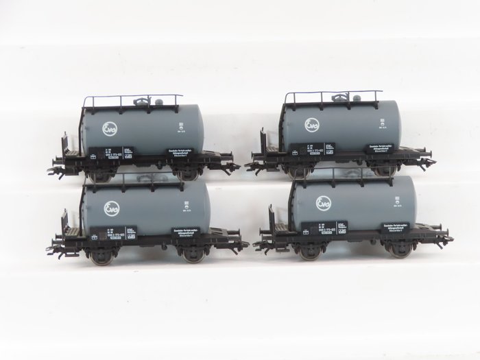 Piko H0 - 57716 - Machetă tren transport marfă (4) - 4x vagoane cisternă cu 2 osii cu imprimeu „EVA”. - DB