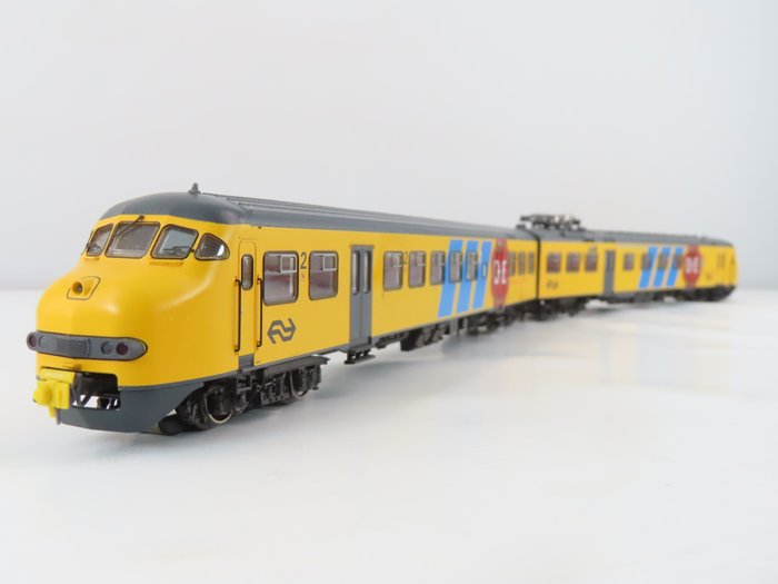Roco H0轨 - 69159 - 火车单元 (1) - Plan V 采用黄色配色方案，带有“DE”标志和完整的声音 - NS