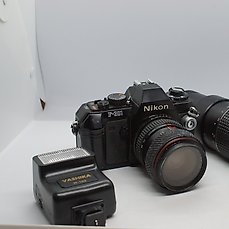Nikon F-301 + Tokina SD 28-70mm +  Makinon 400mm Analoge camera