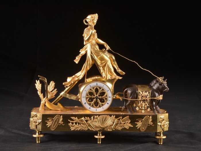 Horloge de cheminée avec personnage - Caillouet a Paris (1733-1810). Louis XVI Bronze doré et patiné - 1750-1800