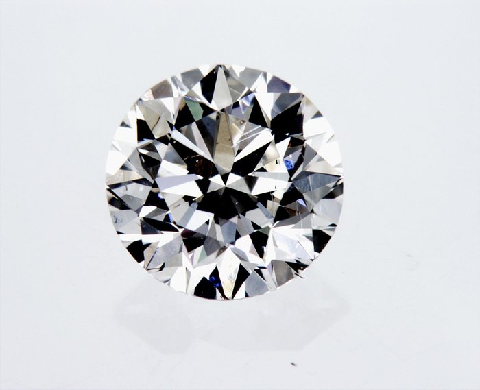 1 pcs Diamant  (Natur)  - 0.91 ct - Rund - J - VS2 - International Gemological Institute (IGI)