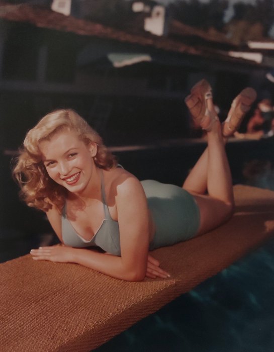 Bruno Bernard - Marilyn Monroe on diving board in Palm Springs.