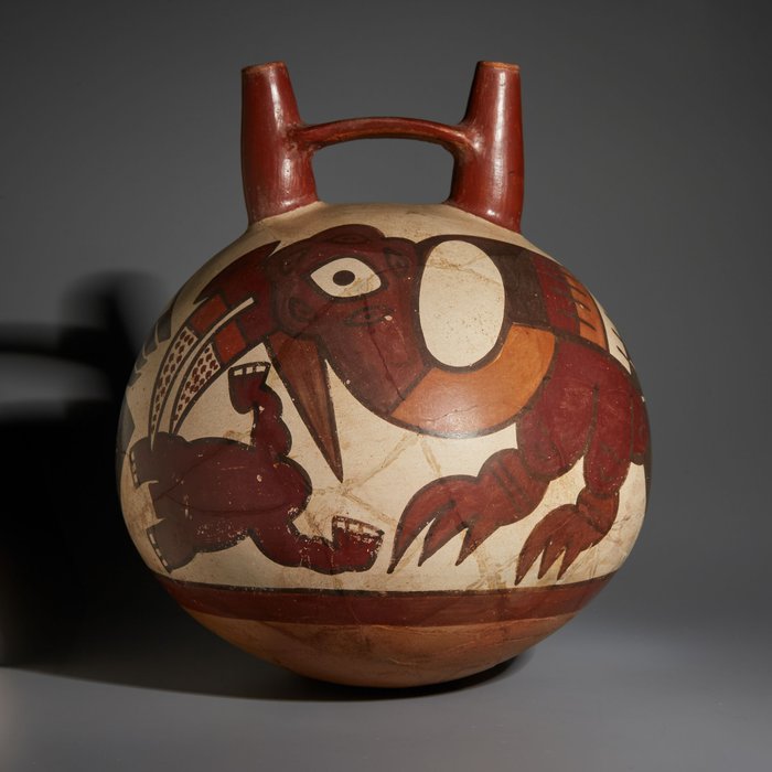 秘鲁纳斯卡 Terracotta 带马镫柄的碗。公元 100-800 年。高 19.2 厘米。西班牙进口许可证。