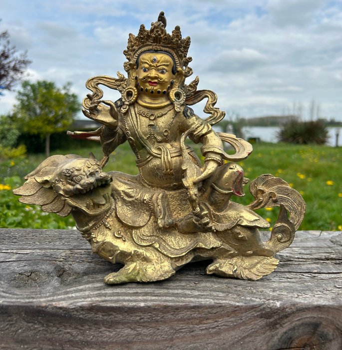 Una figura de Jambhala en bronce dorado chino-tibetano - Bronce - Tíbet - Finales del siglo XX/siglo XXI