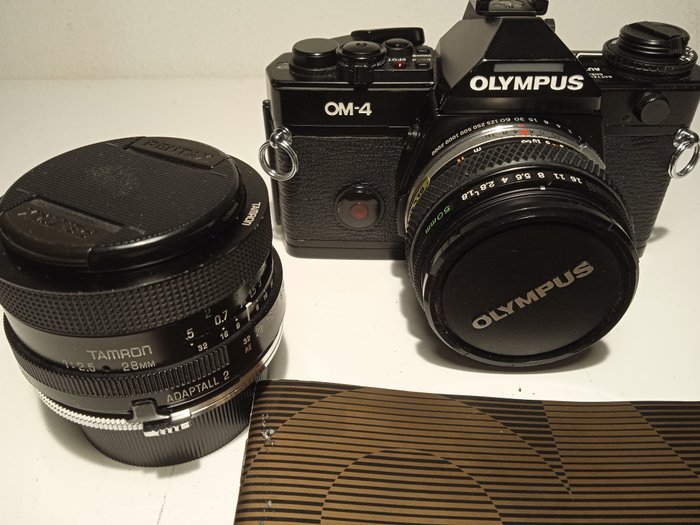 Olympus OM-4 + Zuiko 50mm+ Tamron 28mm Yksilinssinen digitaalinen peiliheijastuskamera (SLR)