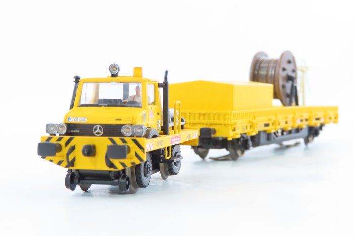 Märklin H0 - 39940 - Zestaw pociągów (1) - Dwukierunkowy Unimog z wagonem konstrukcyjnym na linii trakcyjnej „MFX Sound” - DB