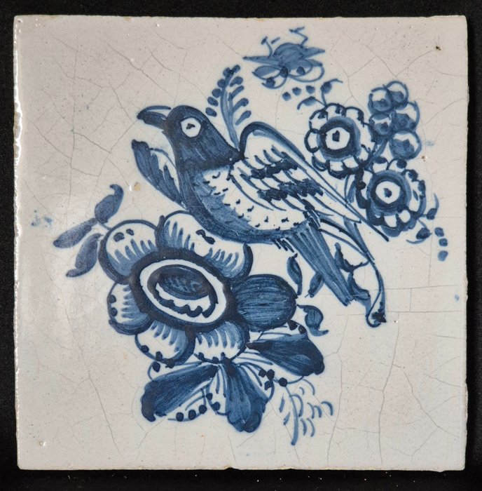 Țiglă - Delfts blauwe tegel uit Friesland met vogel en bloemen - 1750-1800 