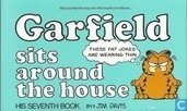 Garfield sits around the house